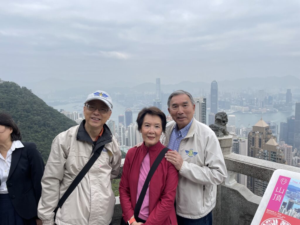 May be an image of 5 people and Victoria Peak