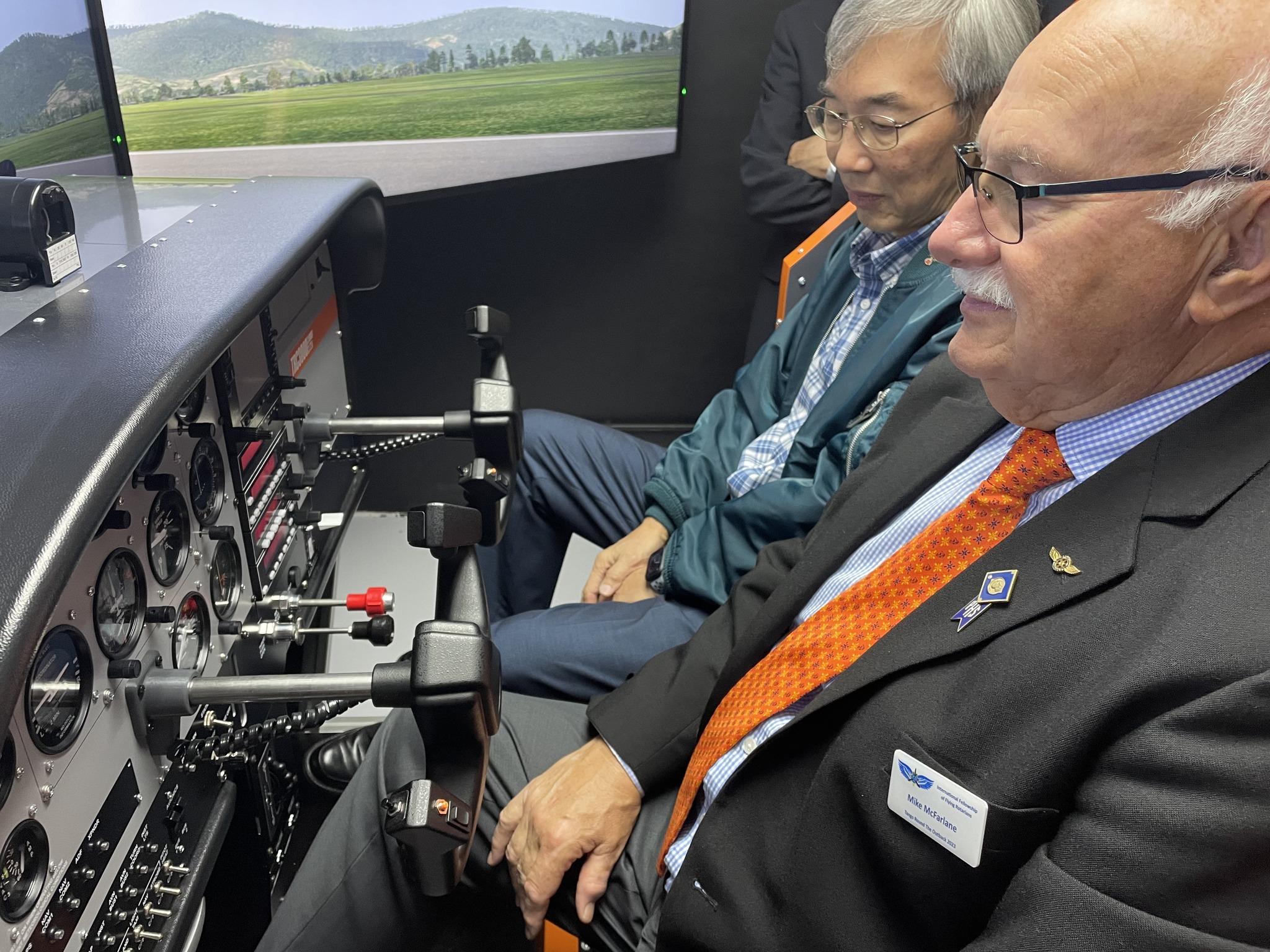 May be an image of 1 person, aircraft and text