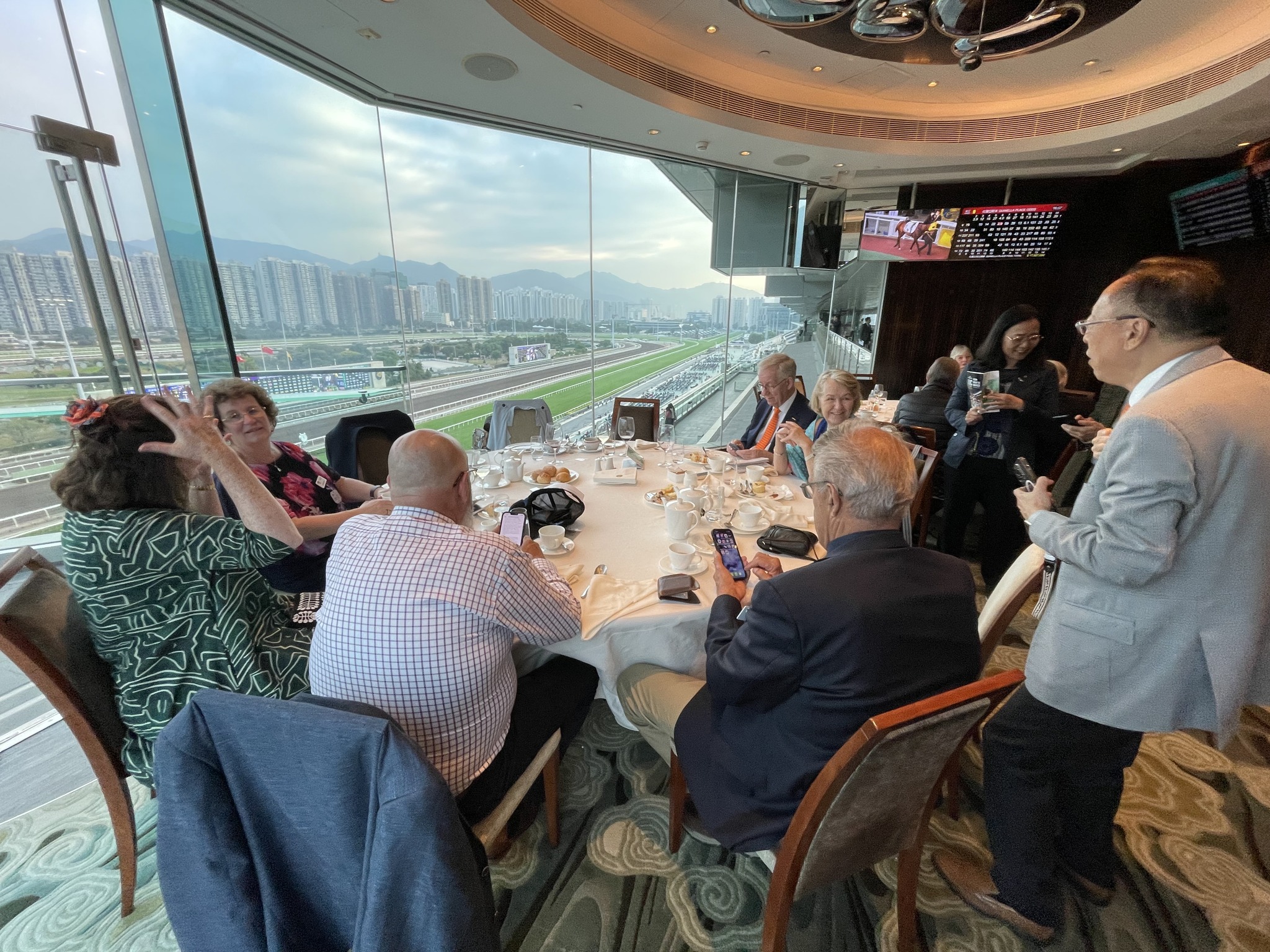 May be an image of 7 people, crowd and text