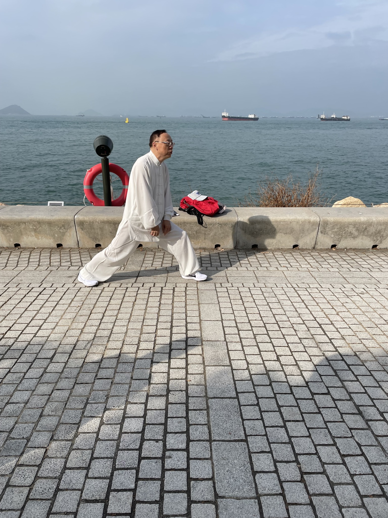 May be an image of 1 person and street