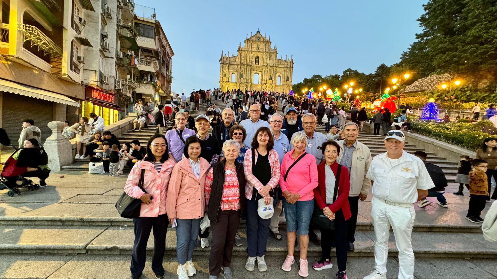 May be an image of 4 people, temple and monument