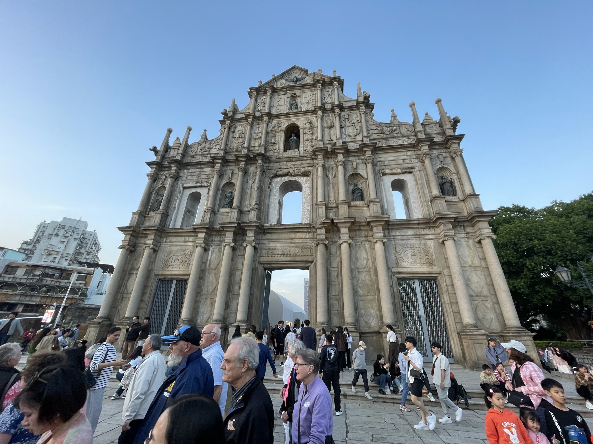 May be an image of 5 people and the Brandenburg Gate