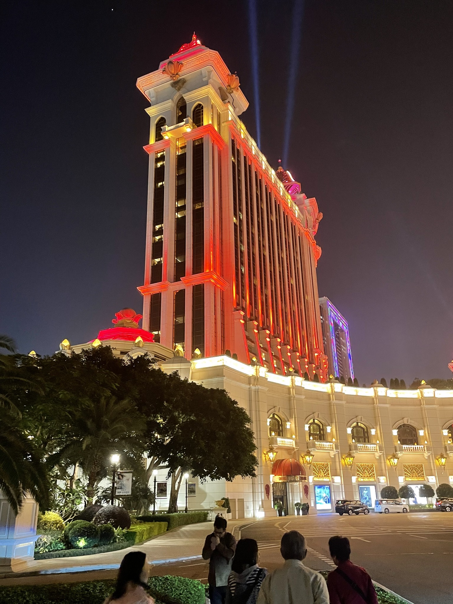 May be an image of 5 people, monument and text